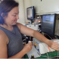 Figure 5: Hannah measuring variable fluorescence in the FIRe instrument.